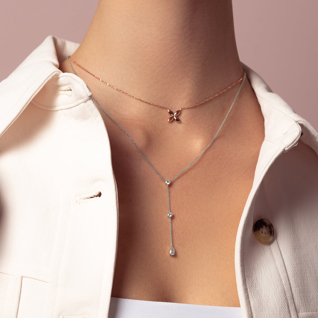 Model wearing Ecksand's Three-Stone Lariat Necklace in 18k White Gold, Lab-grown VS2+/ F+