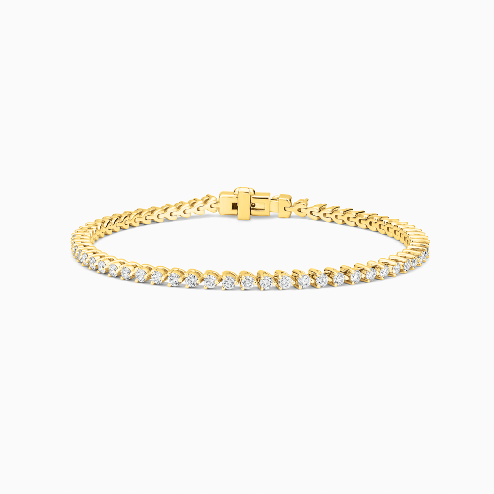The Ecksand Petite Three-Prong Diamond Tennis Bracelet shown with Natural VS2+/F+ in 14k Yellow Gold