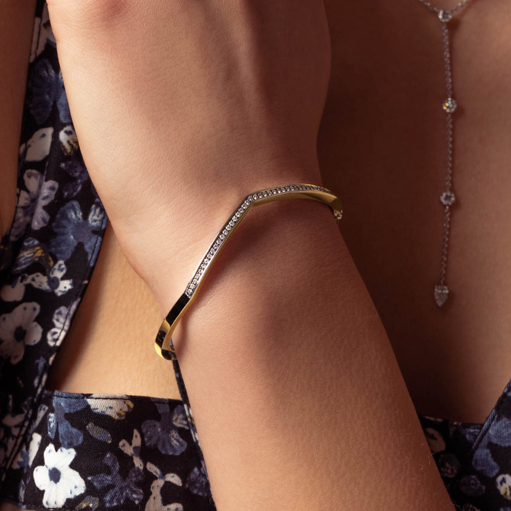 The Ecksand Signature Diamond Pavé Bangle with Blackened Gold shown with  in 