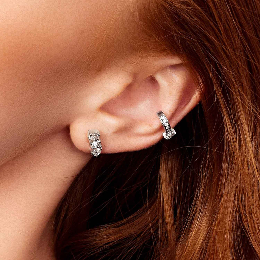 The Ecksand Three-Stone Diamond Bar Earrings shown with  in 