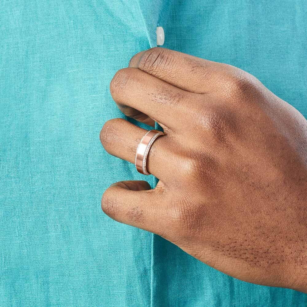 Model wearing Ecksand's Brushed Wedding Ring with Diamond Pave in 18k Rose Gold, Lab-grown VS2+/ F+