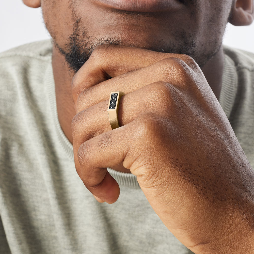 The Ecksand Three Stone Wedding Ring with Black Spinels shown with  in 