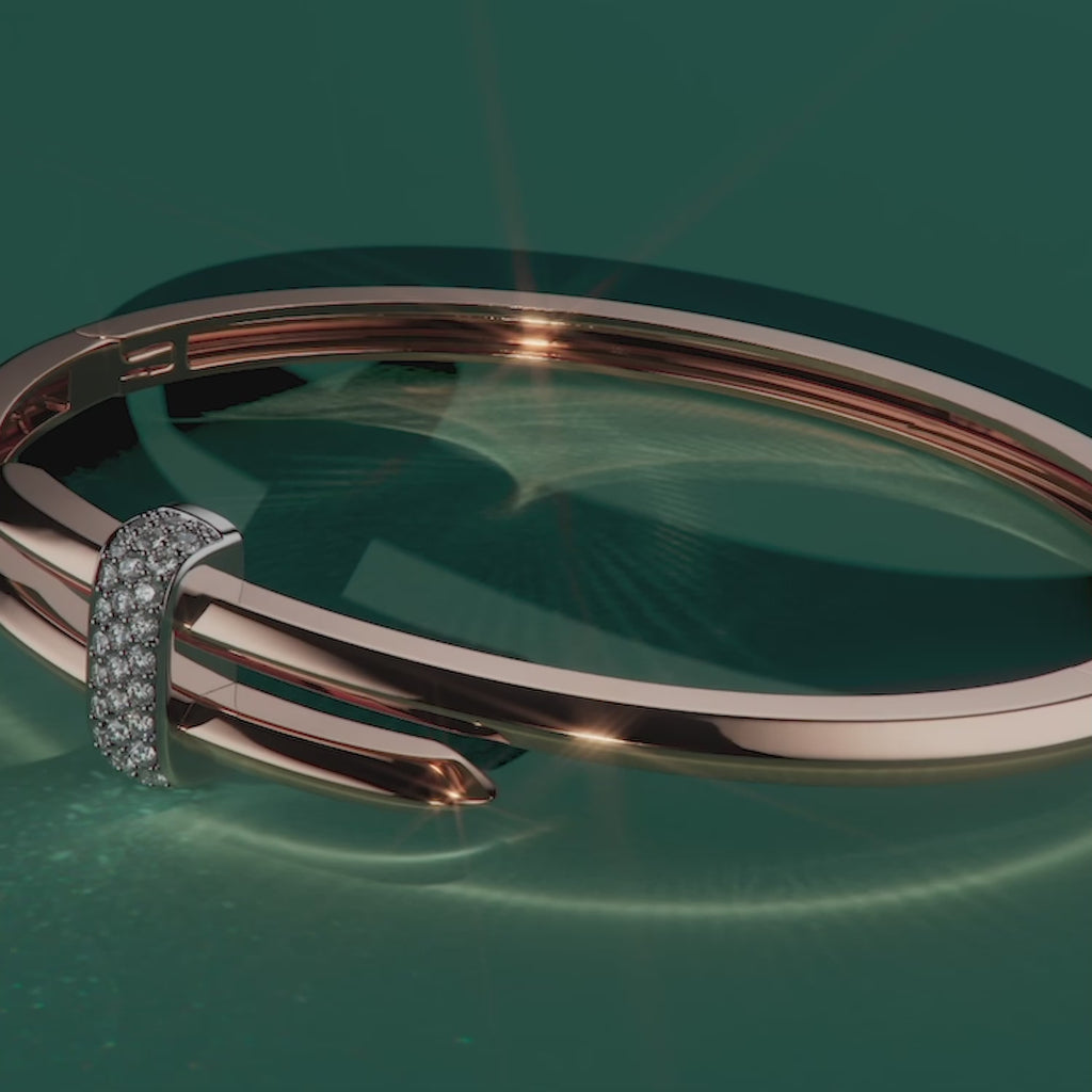 Video showcasing Ecksand's Iconic Duel Gold Wrap Bangle with Diamond Pavé in 14k Rose Gold, Lab-grown VS2+/ F+, 158mm