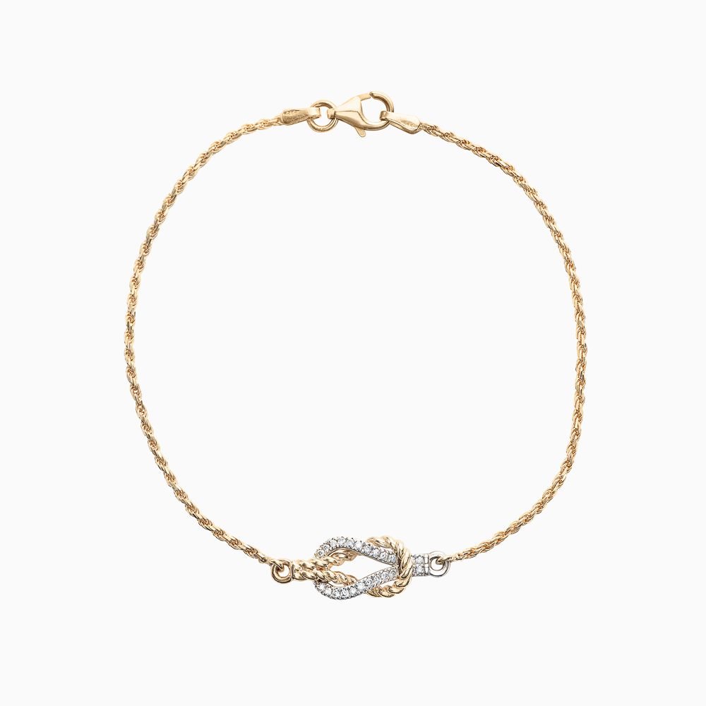 The Ecksand Twisted Gold Knot Bracelet with Diamond Pavé shown with  in 14k Yellow Gold