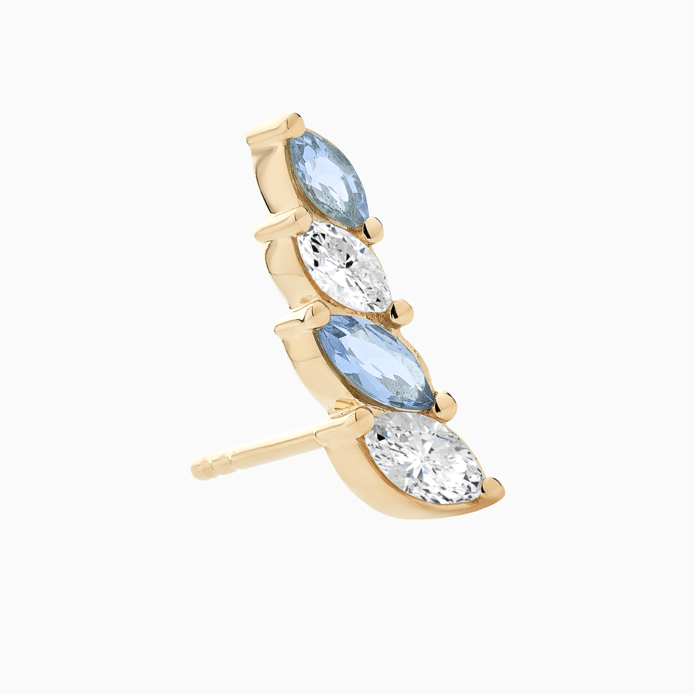 The Ecksand Diamond and Aquamarine Crawler Earrings shown with  in 