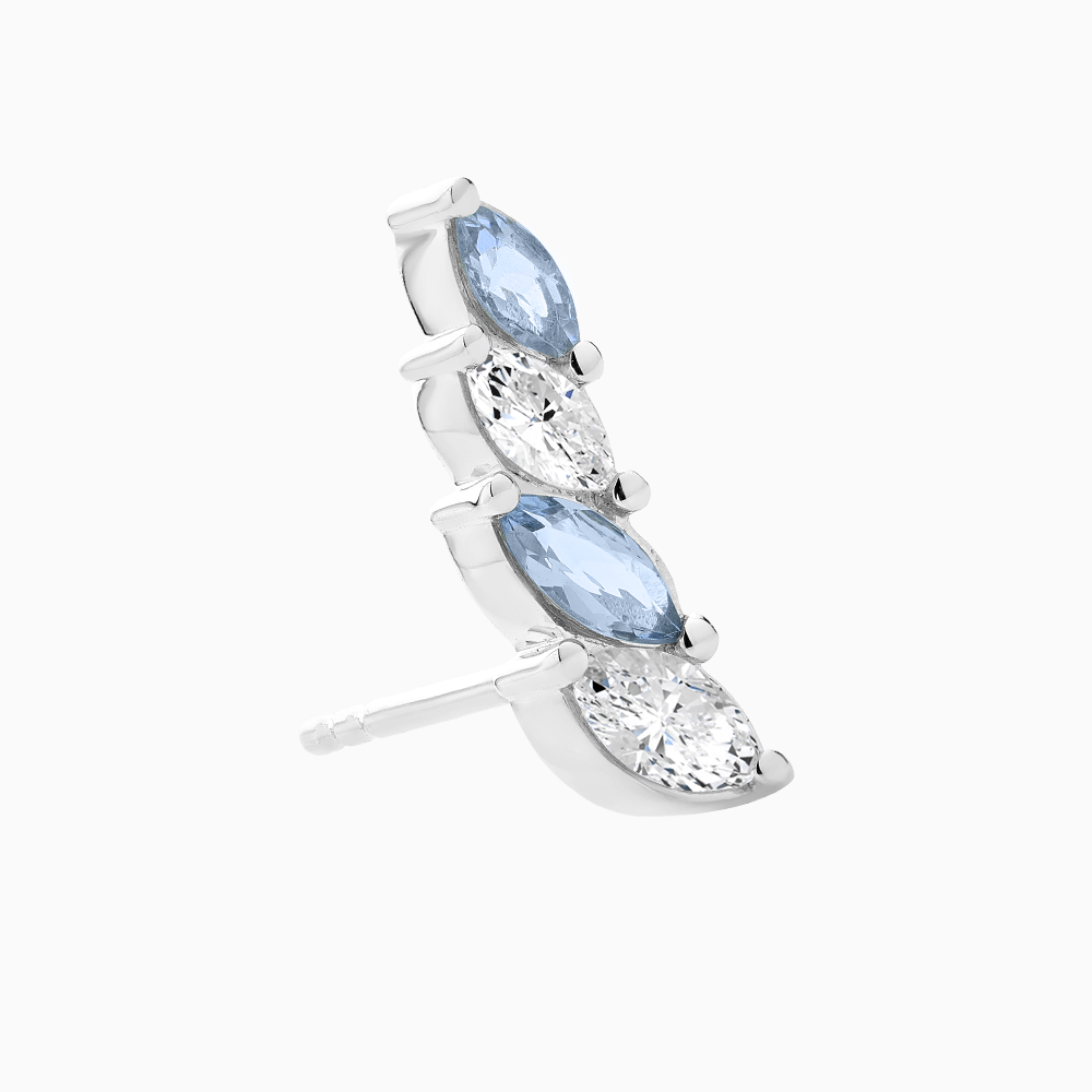 The Ecksand Diamond and Aquamarine Crawler Earrings shown with  in 