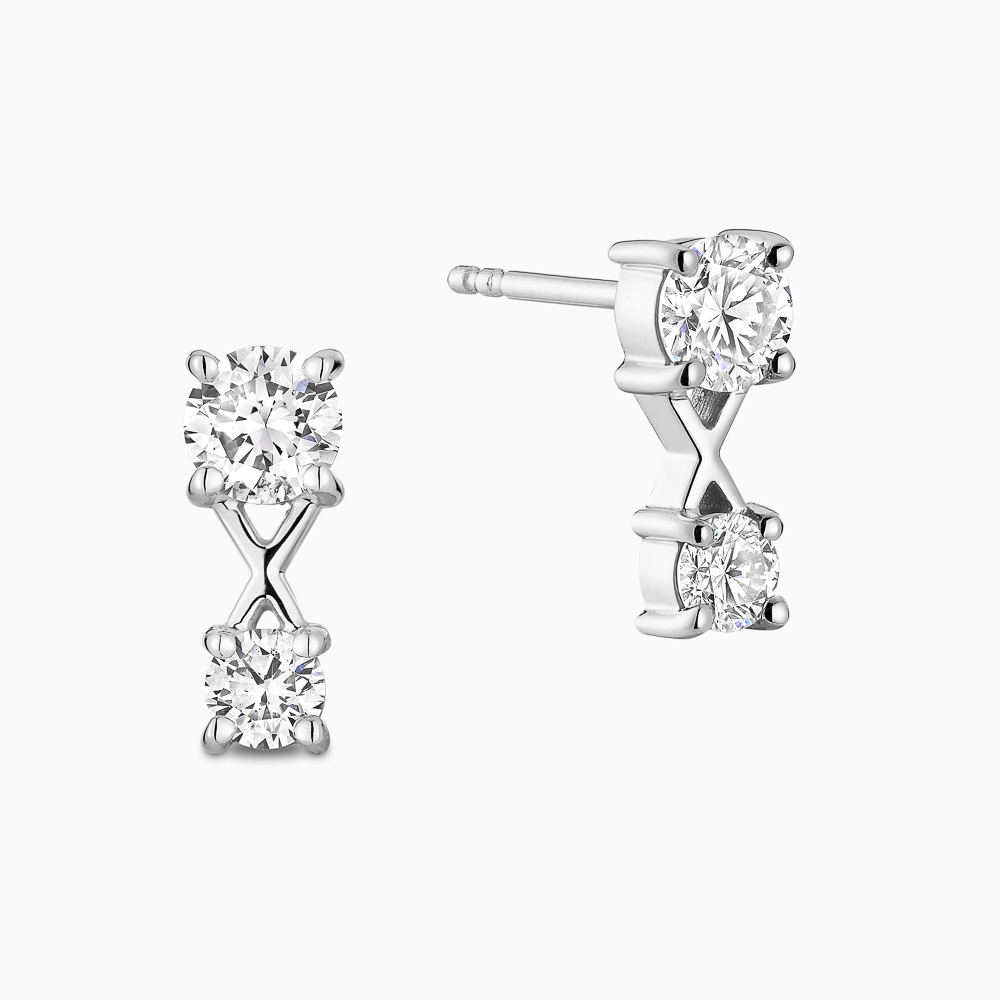 The Ecksand Interlocking X's Diamond Stud Earrings shown with Natural VS2+/ F+ in 18k White Gold