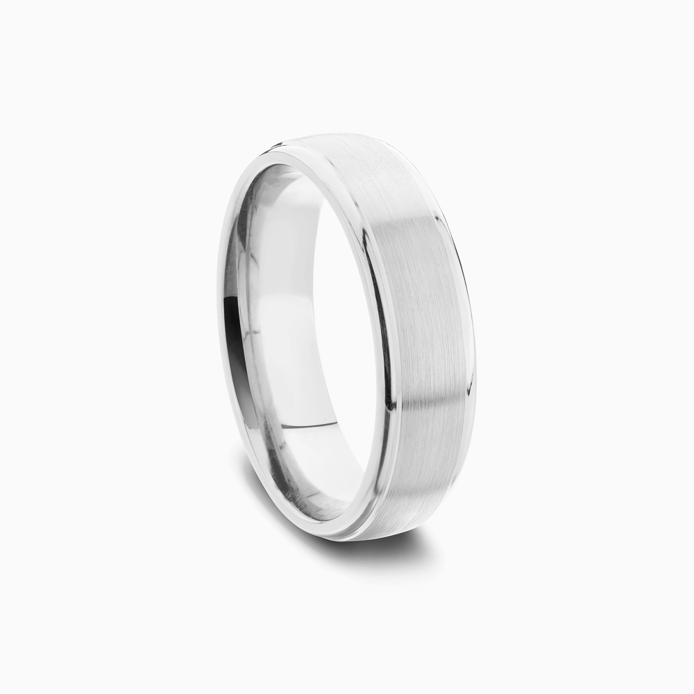 The Ecksand Thick Round-Edged Wedding Ring shown with  in 