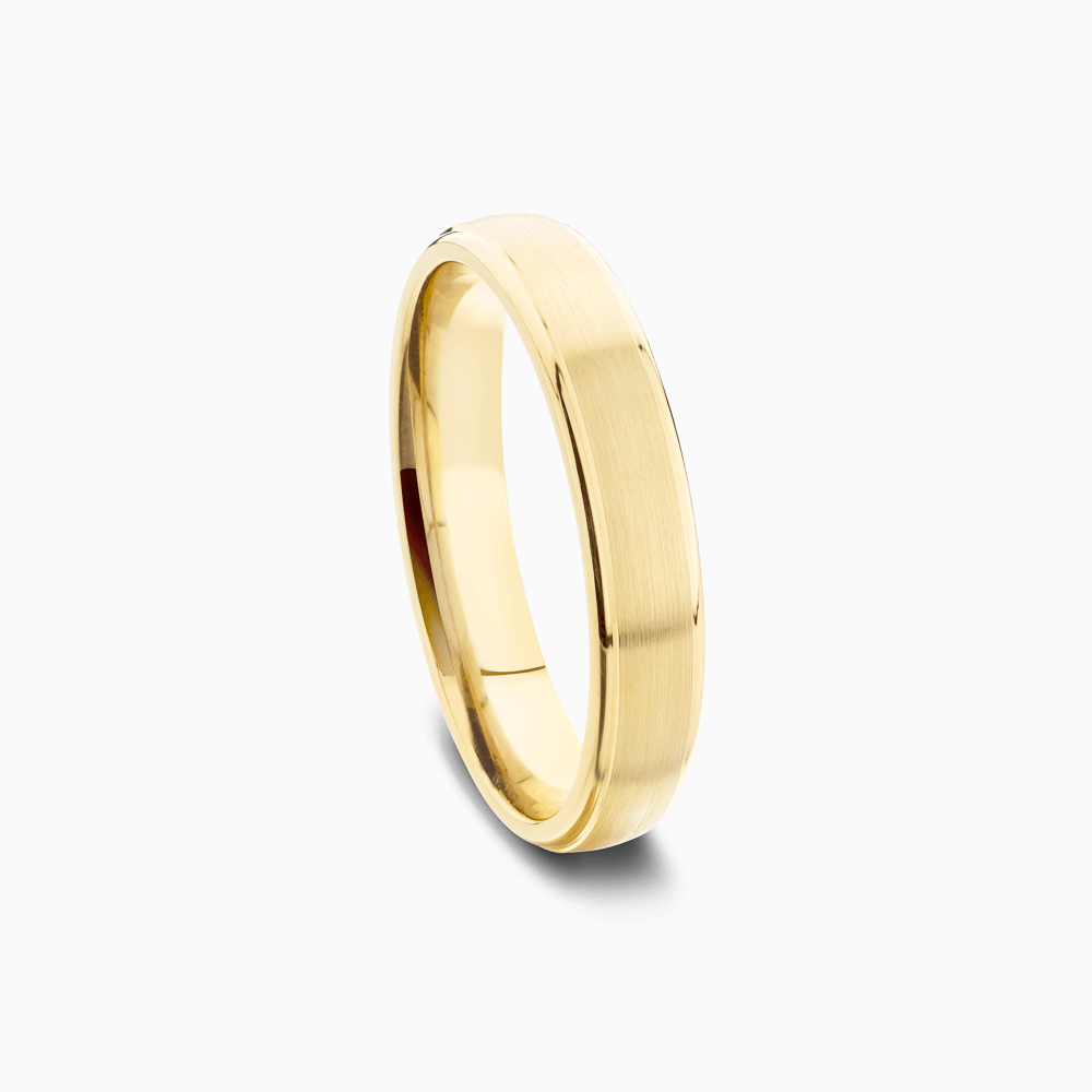 The Ecksand Round-Edged Wedding Ring shown with  in 
