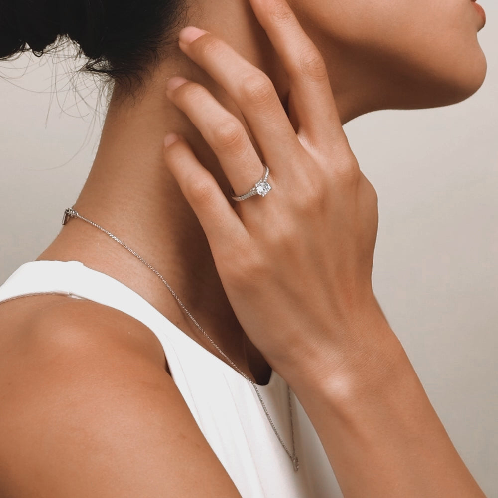 Video showcasing Ecksand's Diamond Engagement Ring with Bright-Cut Band and Diamond Bridge in Platinum, Round