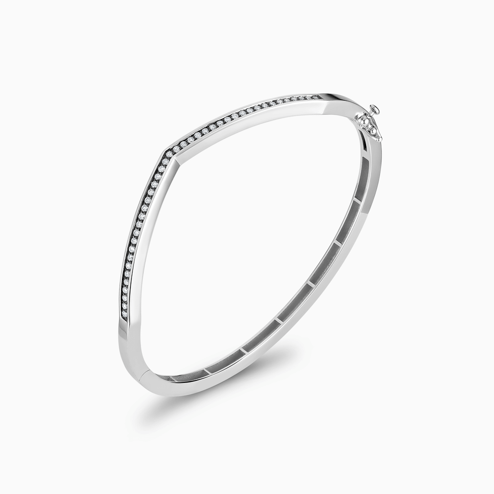The Ecksand Signature Diamond Pavé Bangle with Blackened Gold shown with Natural VS2+/ F+ in 18k White Gold