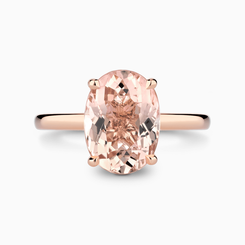 The Ecksand Solitaire Morganite Engagement Ring with Basket Setting shown with  in 14k Rose Gold