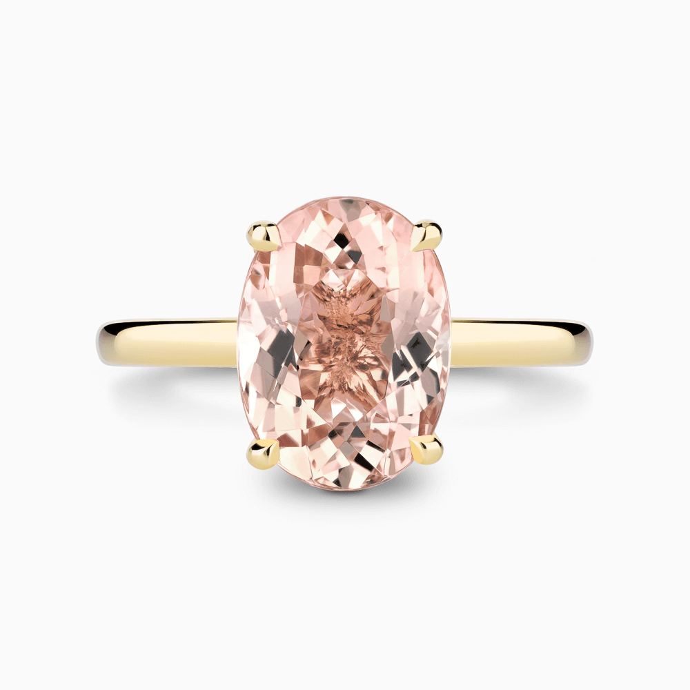 The Ecksand Solitaire Morganite Engagement Ring with Basket Setting shown with  in 18k Yellow Gold