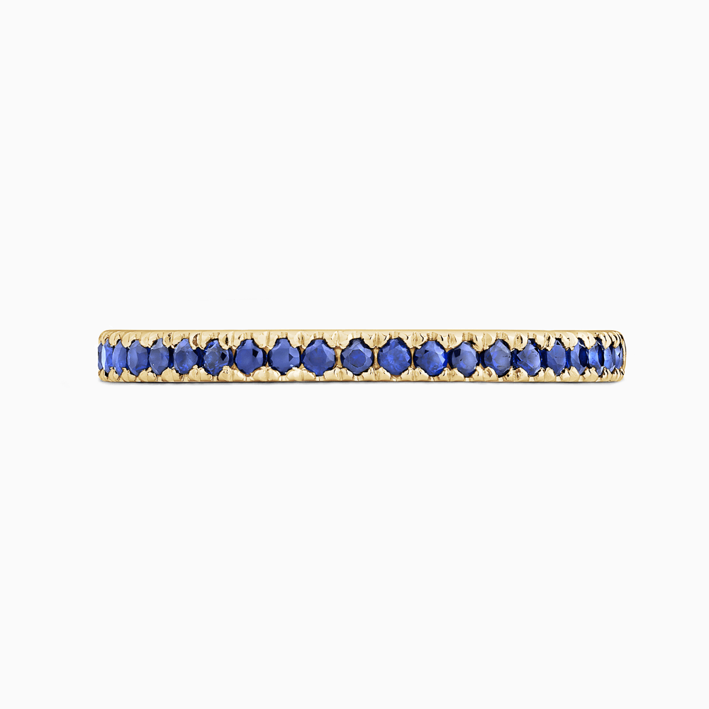 The Ecksand Timeless Blue Sapphire Pavé Wedding Ring shown with Stones: 1.3mm (0.50ctw) | Band: 1.8mm in 18k Yellow Gold