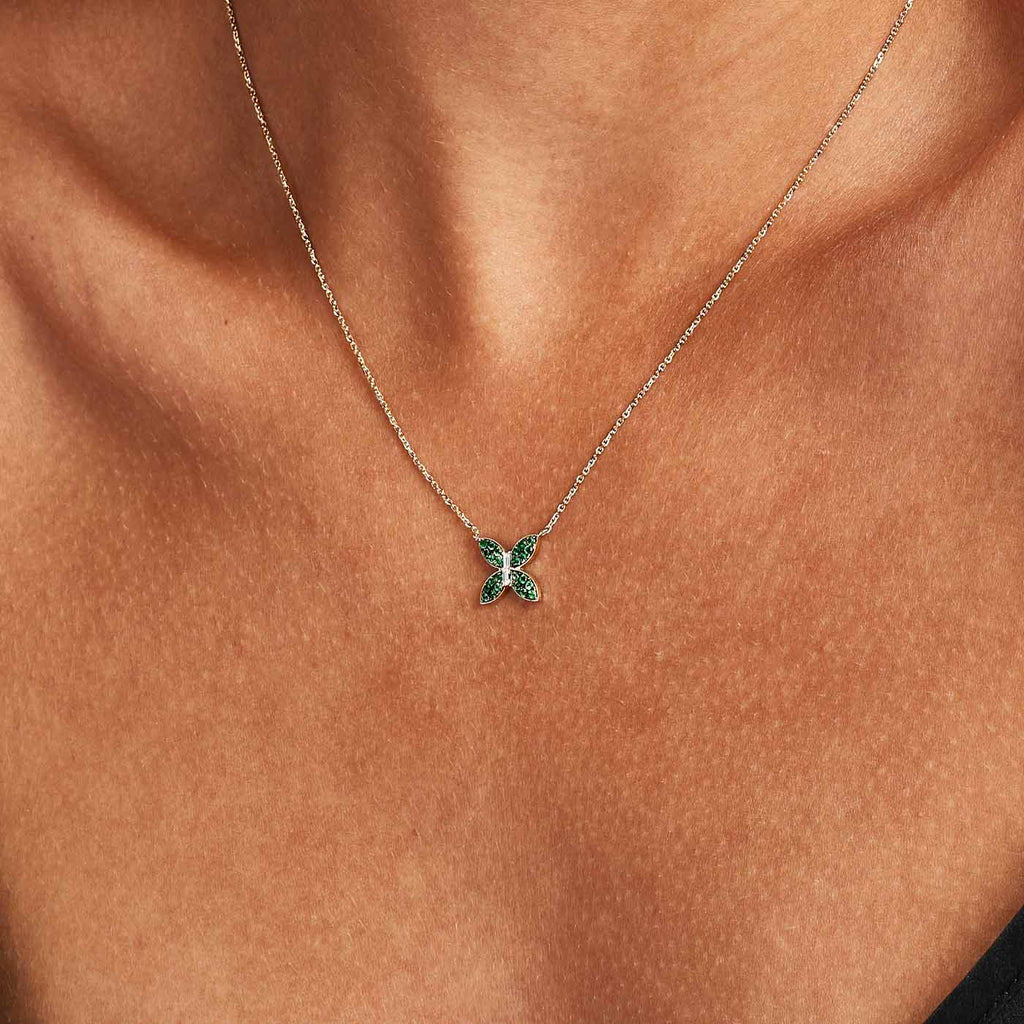 The Ecksand Butterfly Pendant Necklace with Accent Emeralds and Diamonds shown with  in 