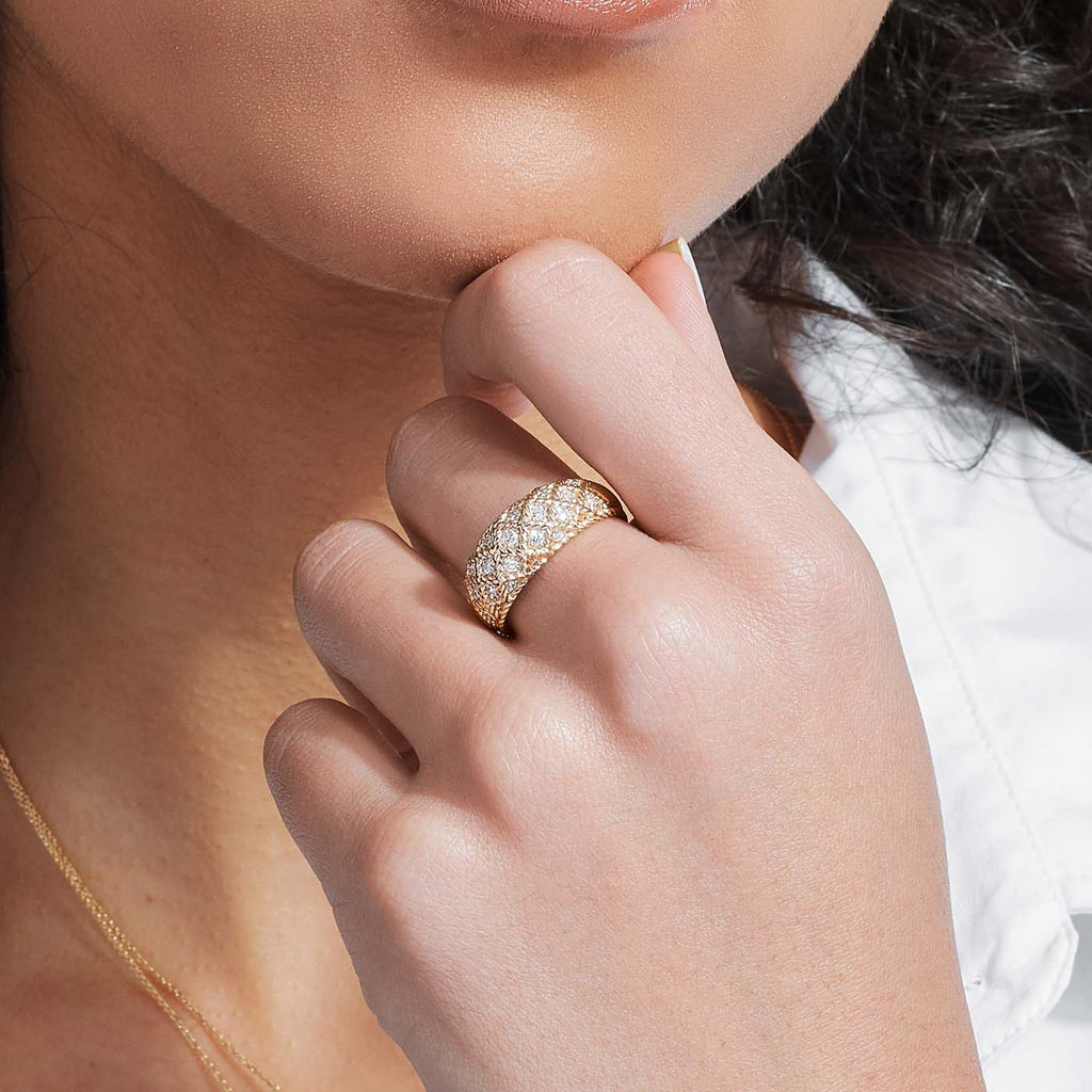 The Ecksand Twisted Gold Bombé Ring with Accent Diamonds shown with  in 