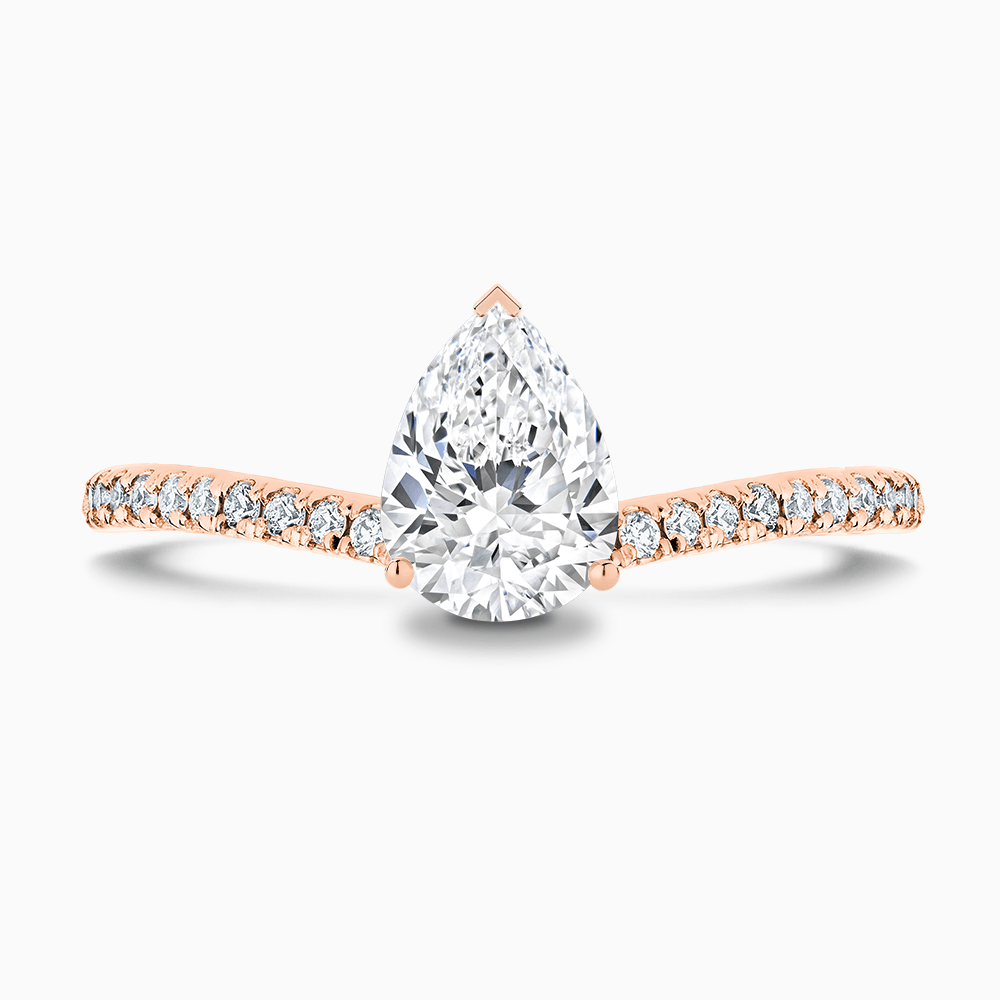 The Ecksand Diamond Engagement Ring with Curved Diamond Band shown with Pear in 14k Rose Gold