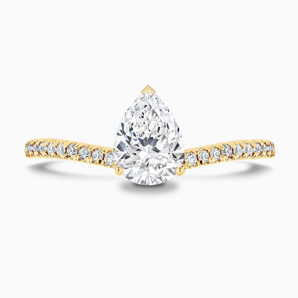The Ecksand Diamond Engagement Ring with Curved Diamond Band shown with Pear in 18k Yellow Gold