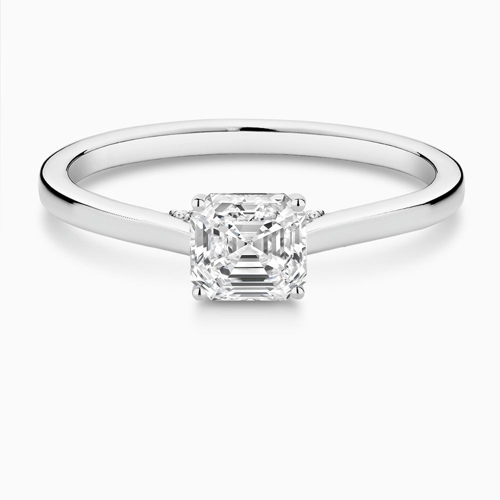 The Ecksand Solitaire Engagement Ring with Diamond Pavé Bridge and Hidden Diamond shown with Asscher in 18k White Gold