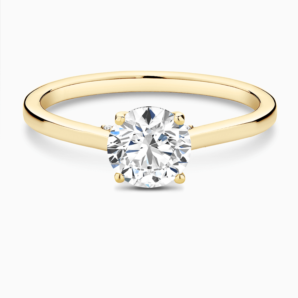 The Ecksand Solitaire Engagement Ring with Diamond Pavé Bridge and Hidden Diamond shown with Round in 18k Yellow Gold