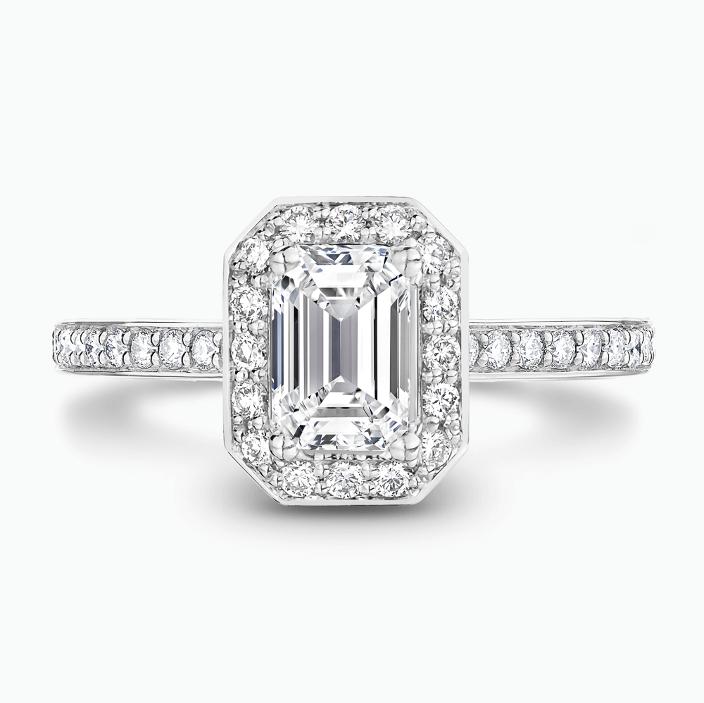 The Ecksand Diamond Halo Engagement Ring with Bright-Cut Diamond Band shown with Emerald in 18k White Gold