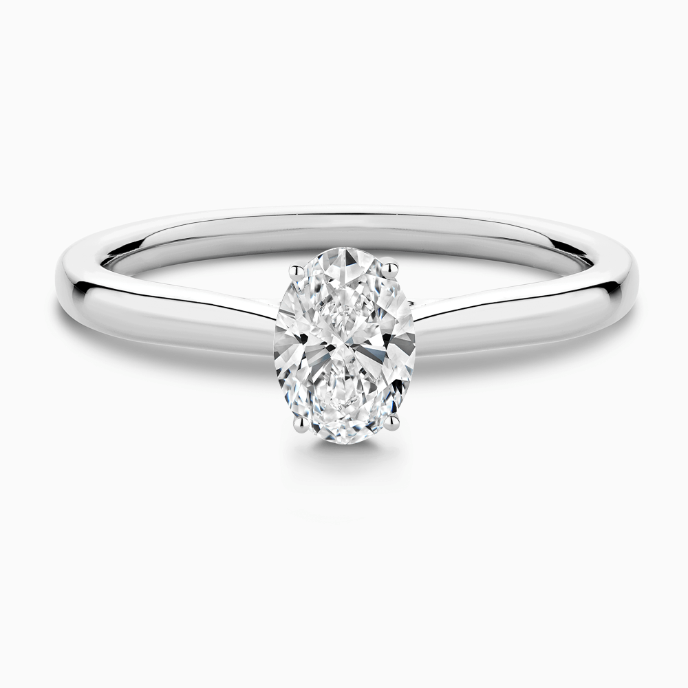 The Ecksand Solitaire Diamond Engagement Ring with Secret Heart shown with Oval in 18k White Gold