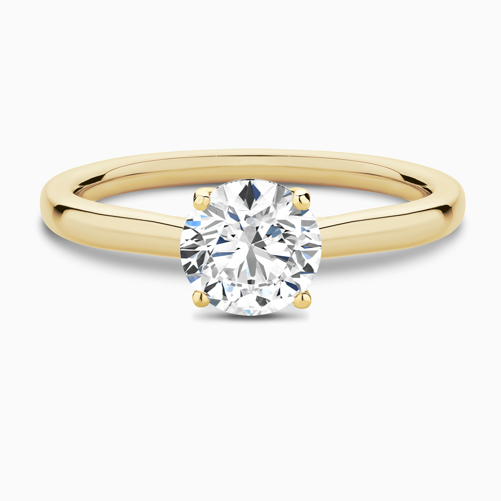 The Ecksand Solitaire Diamond Engagement Ring with Secret Heart shown with Round in 18k Yellow Gold