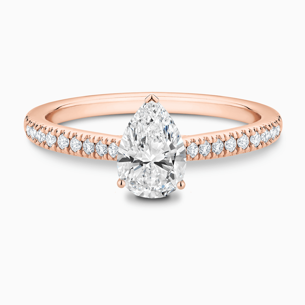 The Ecksand Diamond Engagement Ring with Secret Heart and Diamond Band shown with Pear in 14k Rose Gold