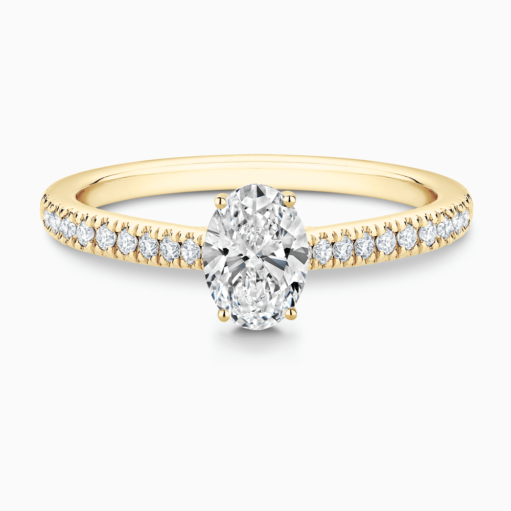 The Ecksand Diamond Engagement Ring with Secret Heart and Diamond Band shown with Oval in 18k Yellow Gold
