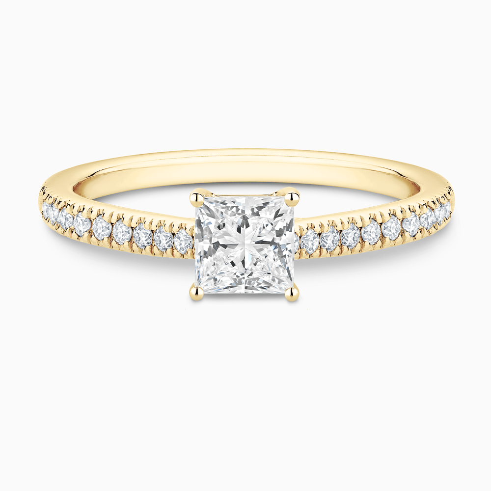 The Ecksand Diamond Engagement Ring with Secret Heart and Diamond Band shown with Princess in 18k Yellow Gold