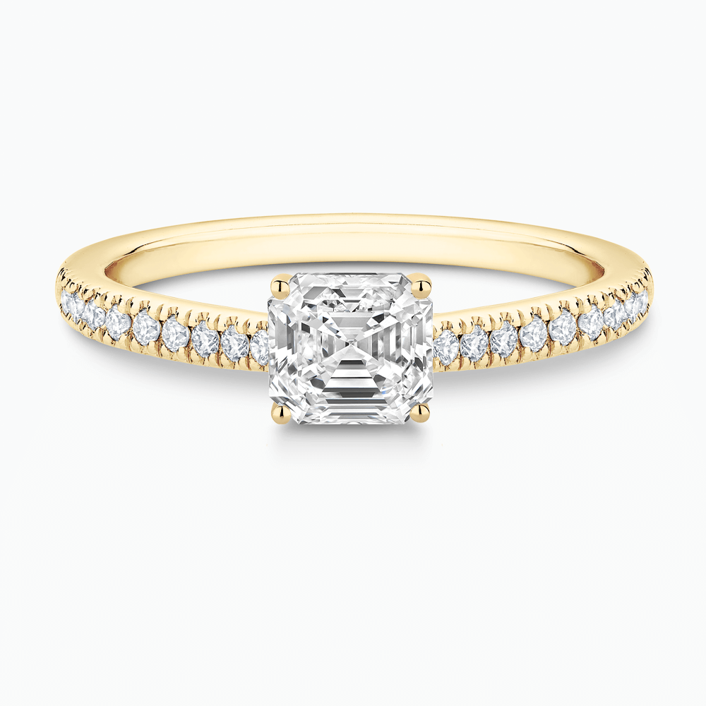 The Ecksand Diamond Engagement Ring with Secret Heart and Diamond Band shown with Asscher in 18k Yellow Gold