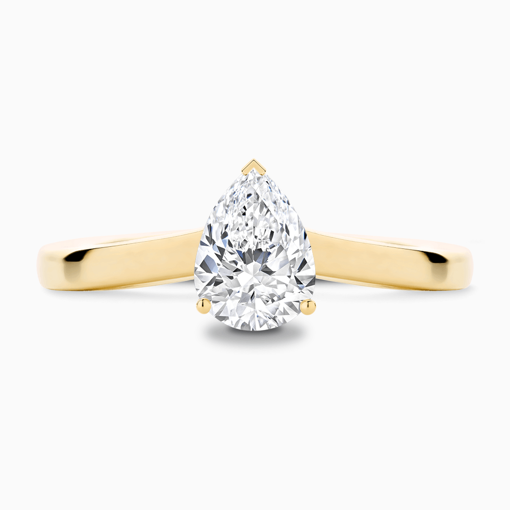 The Ecksand Solitaire Diamond Engagement Ring with Curved Band shown with Pear in 18k Yellow Gold