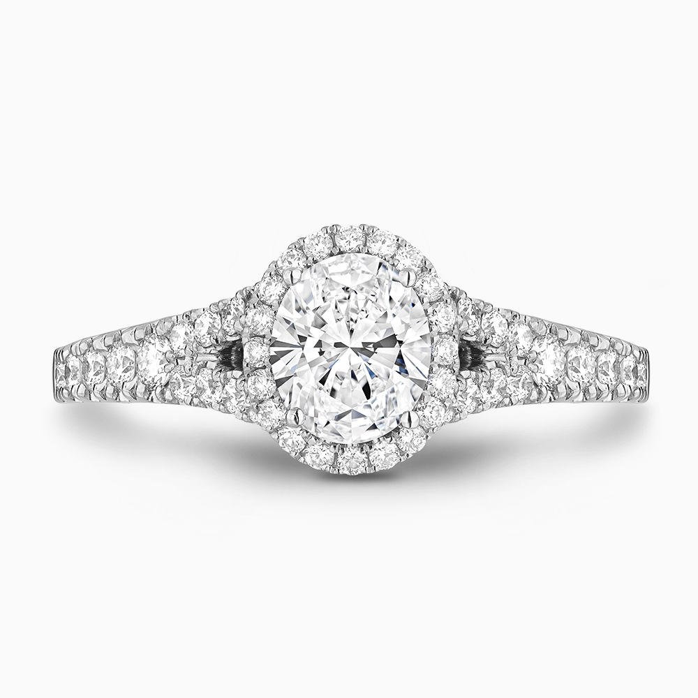 The Ecksand Split Shank Diamond Engagement Ring with Diamond Halo shown with Oval in 18k White Gold