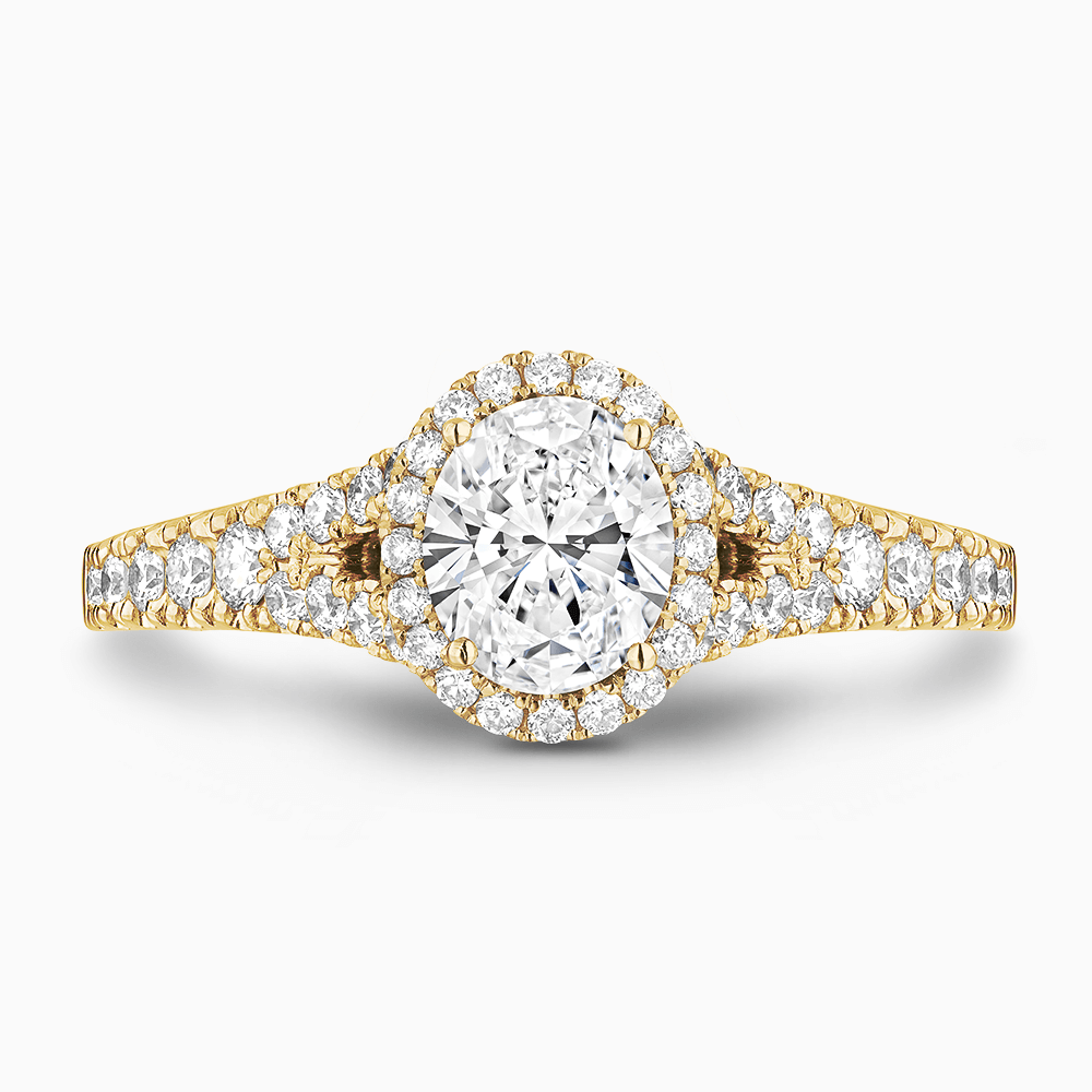 The Ecksand Split Shank Diamond Engagement Ring with Diamond Halo shown with Oval in 18k Yellow Gold