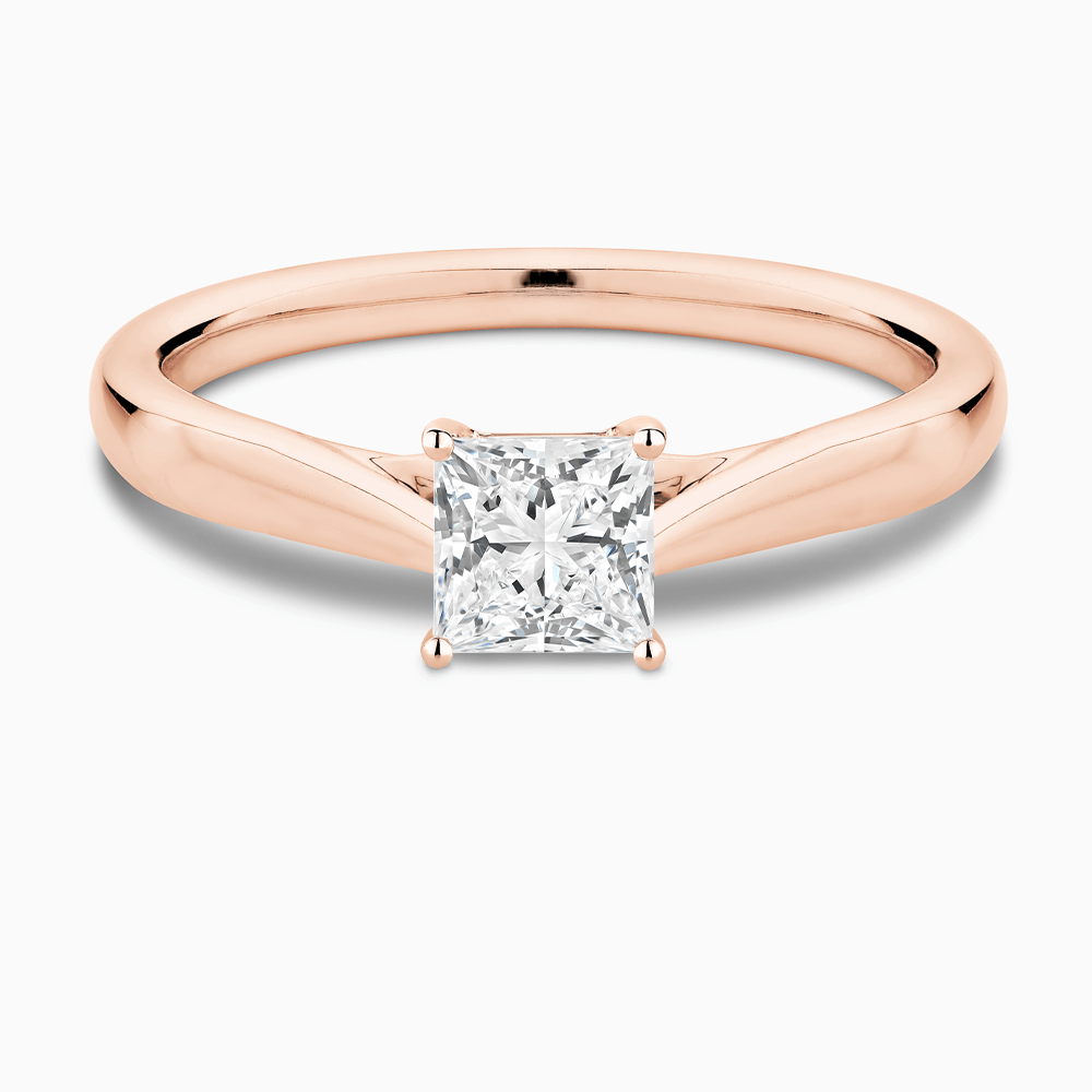 The Ecksand Tapered Band Solitaire Diamond Engagement Ring with Secret Heart shown with Princess in 14k Rose Gold