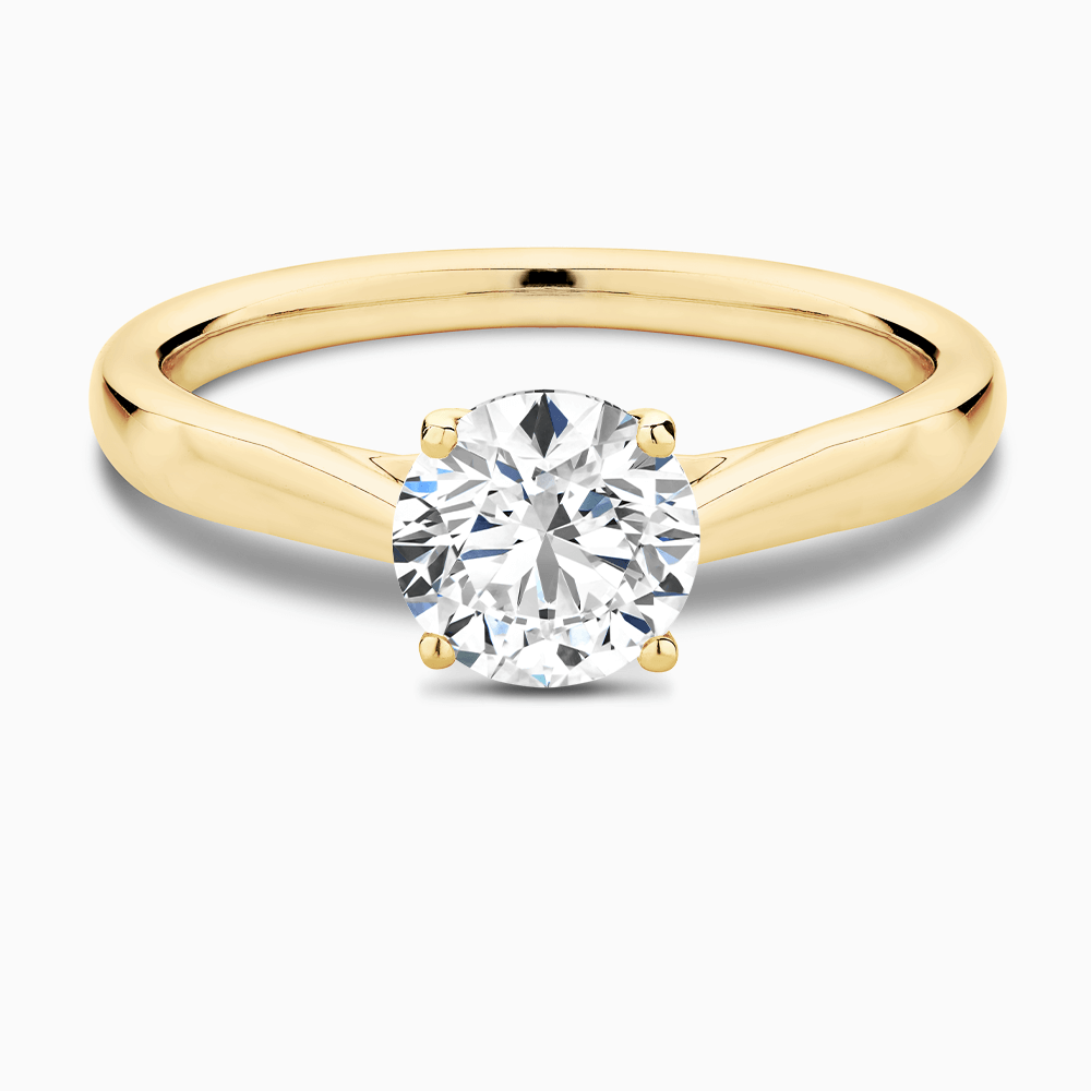 The Ecksand Tapered Band Solitaire Diamond Engagement Ring with Secret Heart shown with Round in 18k Yellow Gold