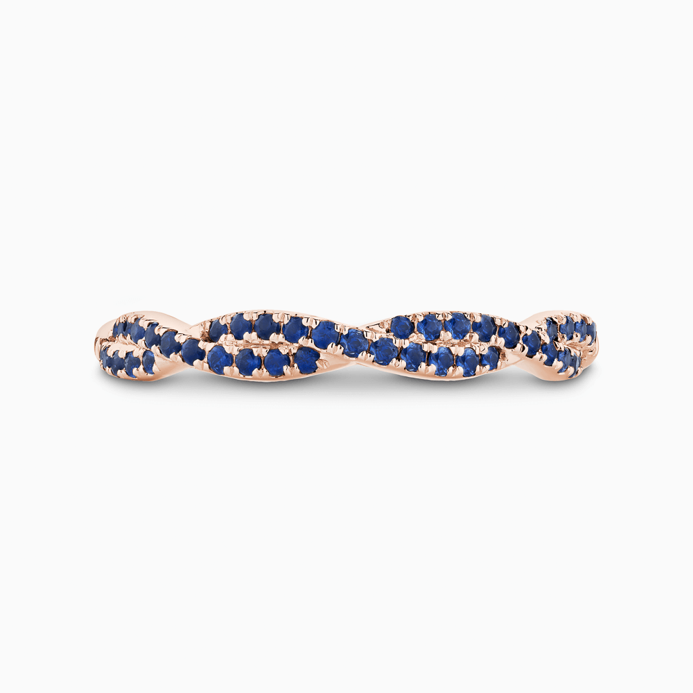 The Ecksand Twisted Wedding Ring with Blue Sapphire Pavé shown with  in 14k Rose Gold