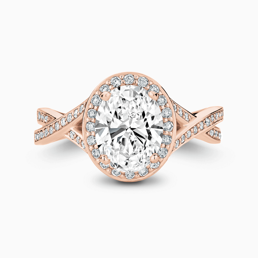The Ecksand Twisted Split Shank Diamond Engagement Ring with Diamond Halo shown with Oval in 14k Rose Gold