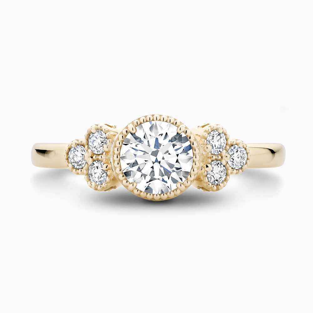 The Ecksand Vintage Diamond Engagement Ring with Six Side Diamonds shown with Round in 18k Yellow Gold