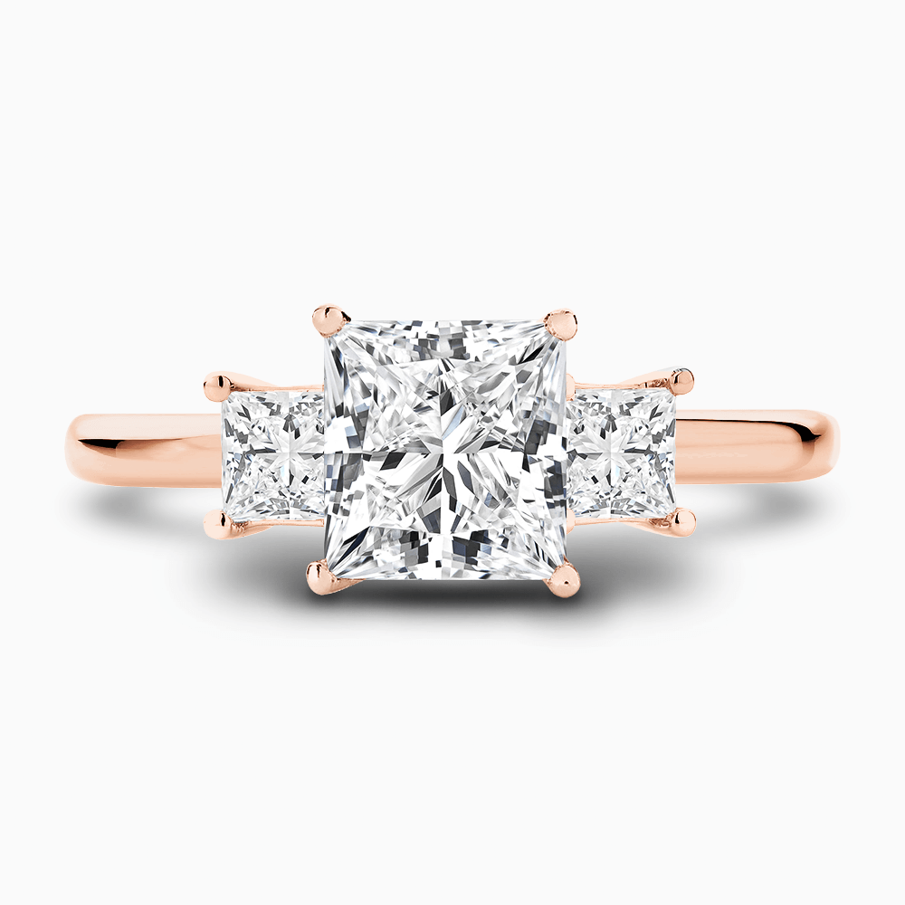 The Ecksand Three-Stone Diamond Engagement Ring shown with Princess in 14k Rose Gold