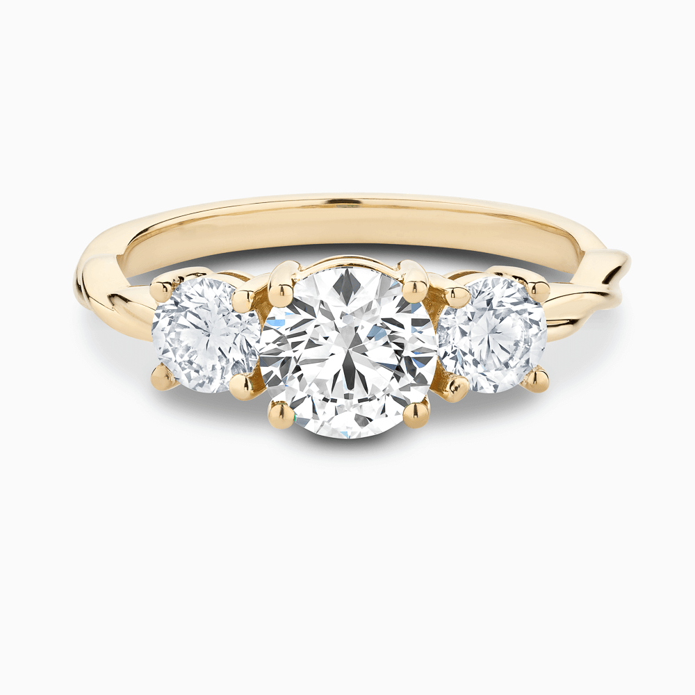 The Ecksand Three-Stone Diamond Engagement Ring with Twisted Band shown with Round in 18k Yellow Gold