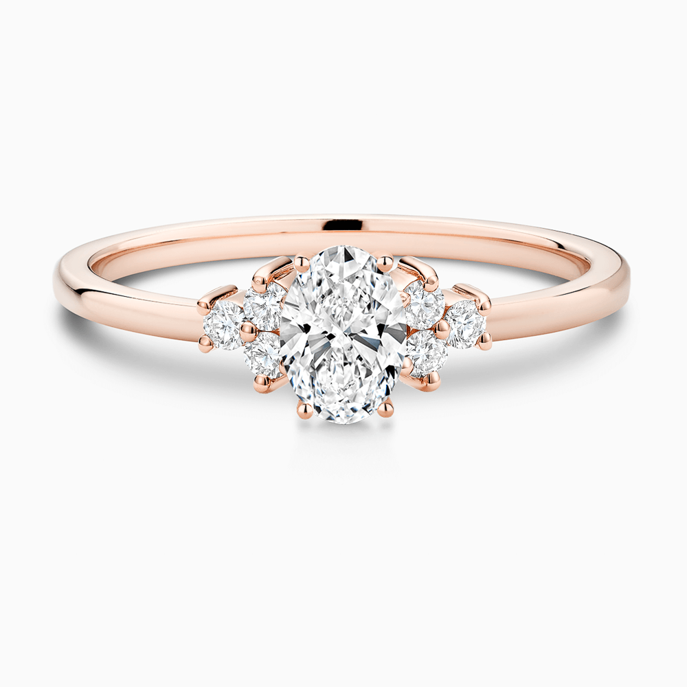 The Ecksand Diamond Engagement Ring with Six Side Diamonds shown with Oval in 14k Rose Gold