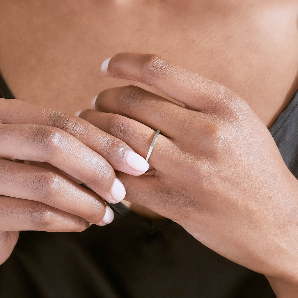The Ecksand Simple Wedding Ring shown with  in 