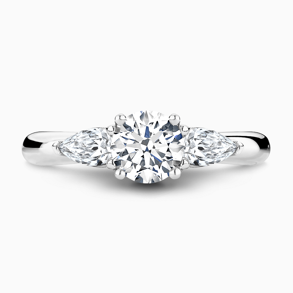 The Ecksand Iconic Three-Stone Diamond Engagement Ring with Cathedral Setting shown with Round in 18k White Gold