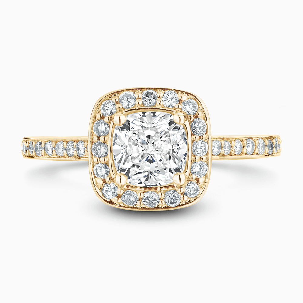 The Ecksand Diamond Halo Engagement Ring with Bright-Cut Diamond Band shown with Cushion in 18k Yellow Gold