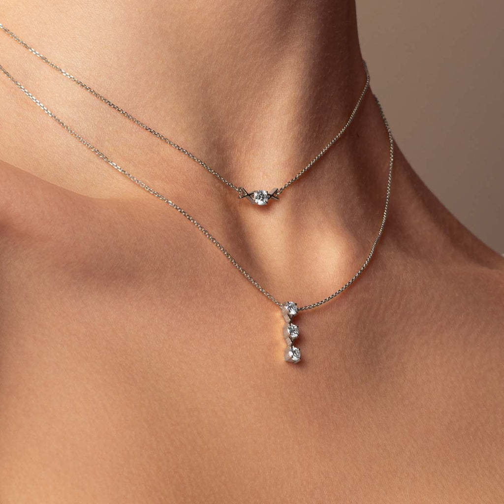 The Ecksand Interlocking X's Diamond Drop Necklace shown with  in 