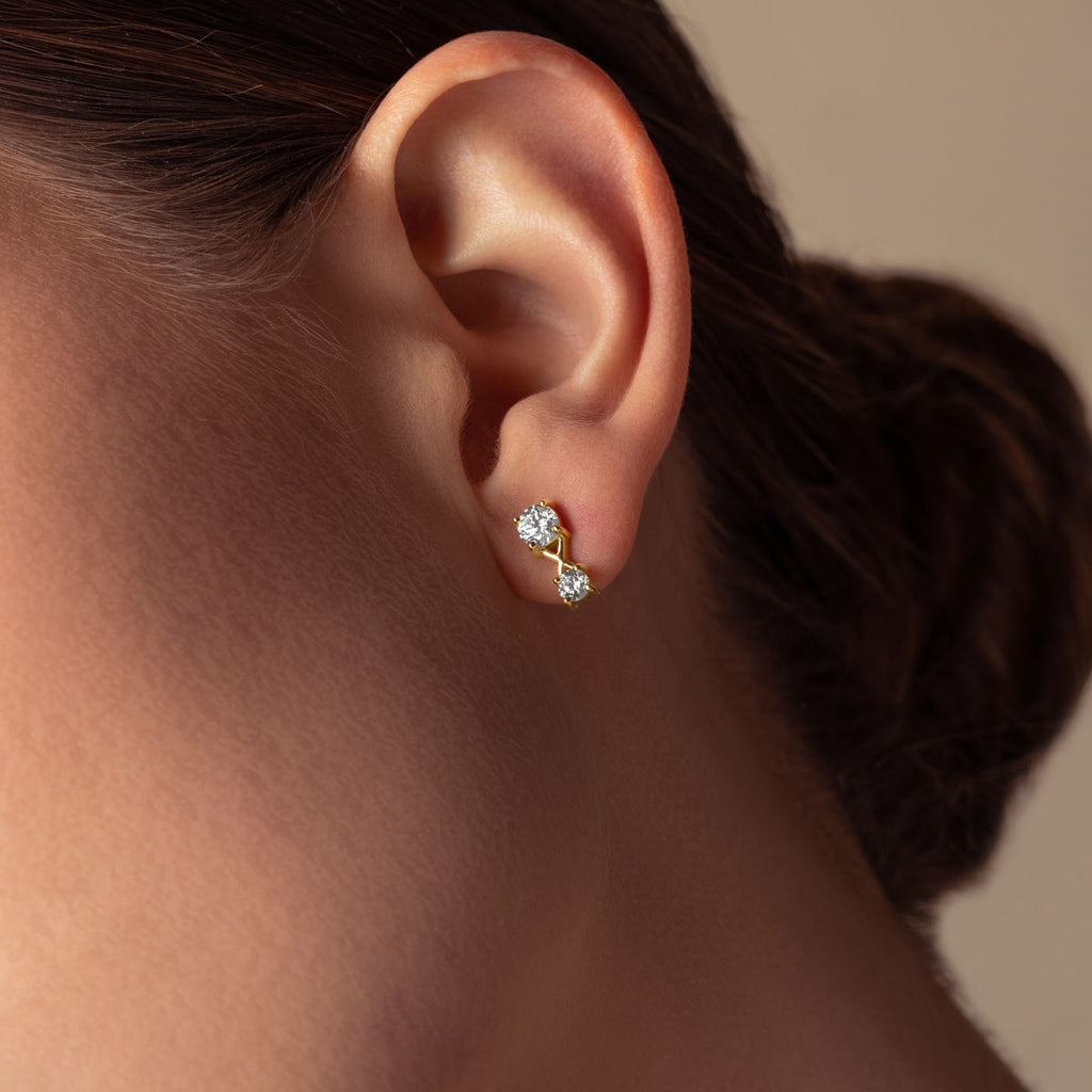 The Ecksand Interlocking X's Diamond Stud Earrings shown with  in 
