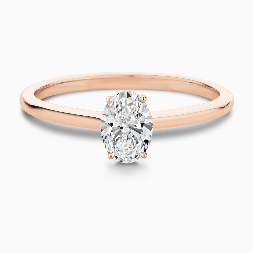 The Ecksand Solitaire Diamond Engagement Ring with Hidden Diamond shown with Oval in 14k Rose Gold