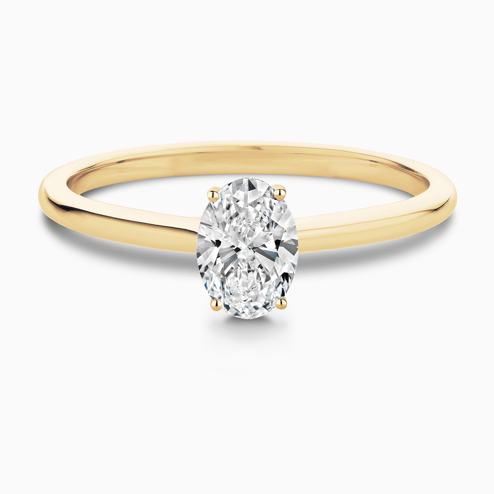 The Ecksand Solitaire Diamond Engagement Ring with Hidden Diamond shown with Oval in 18k Yellow Gold