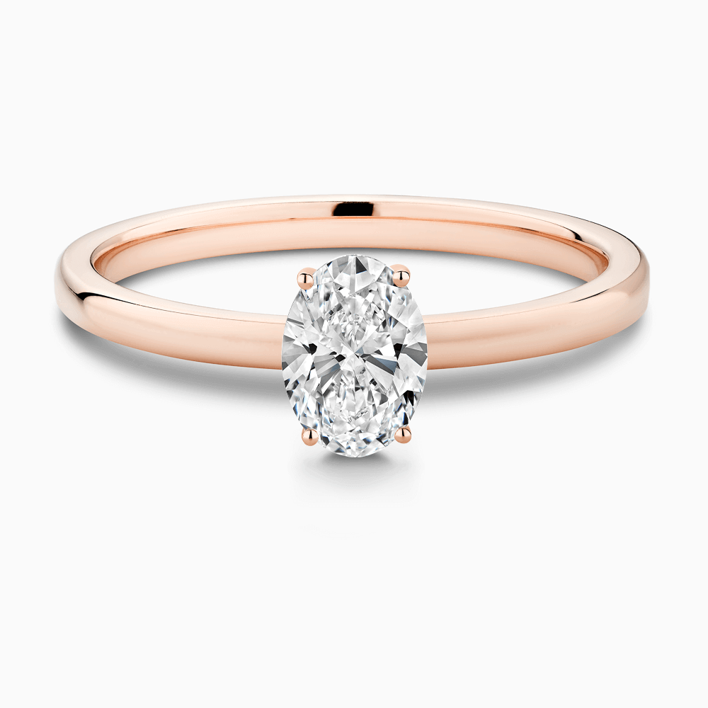 The Ecksand Solitaire Diamond Engagement Ring with Diamond Pavé Basket Setting shown with Oval in 14k Rose Gold